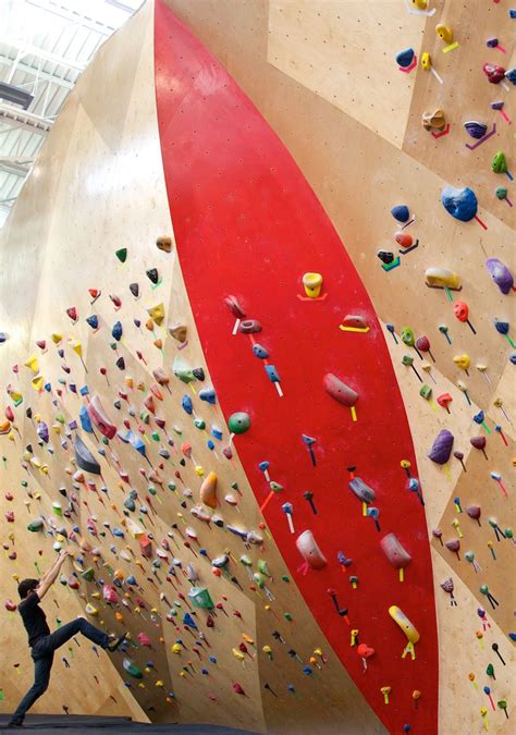 brooklyn boulders coworking space features towering rock climbing wall | Rock climbing wall ...