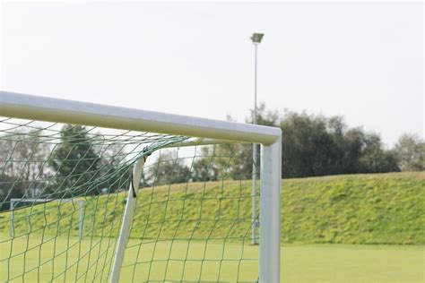 Premium Photo | Close-up of goal post on soccer field