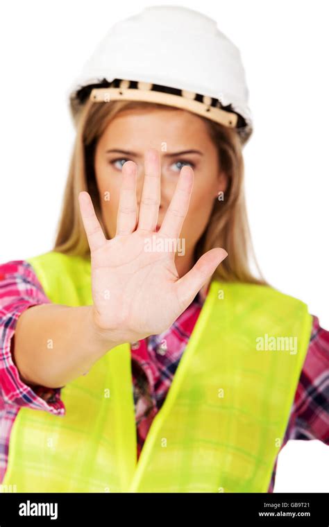 Worker woman making stop sign Stock Photo - Alamy