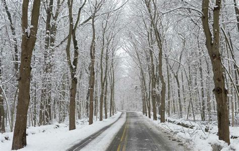 In Norwalk, plenty of snow, but warm pavement shrugs it off