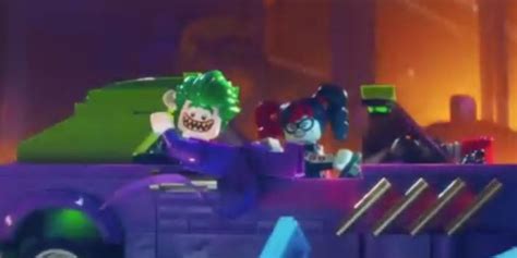 there is a lego batman movie scene with joker and the joker in the back of a car