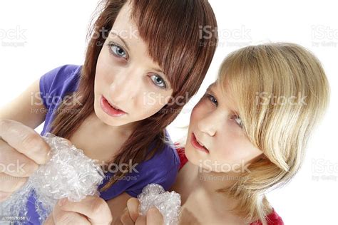 Popping Bubble Wrap Stock Photo - Download Image Now - 16-17 Years, Adult, Adults Only - iStock