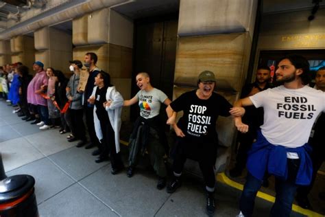 PHOTOS: Climate activists protest to end fossil fuels in Lower Manhattan