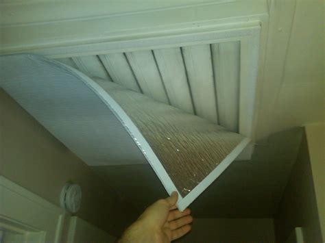 Insulated cover for whole house attic fan grate - The DIY Girl