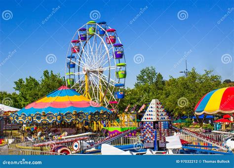 Carnival Rides at Small County Fair Stock Photo - Image of umbrellas ...