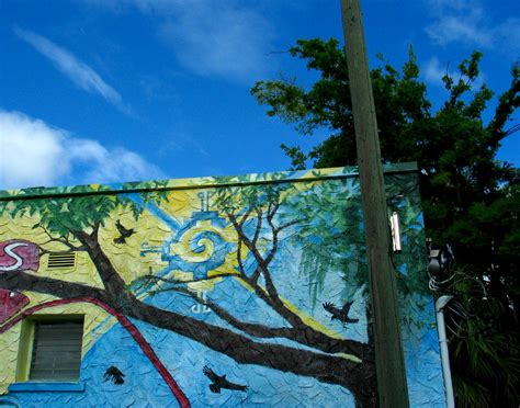 Wild Iris Tree Pole Building Mural Blue Sky Clouds | Flickr