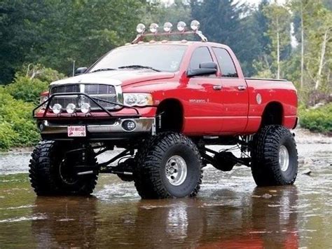 Muddin | Jacked up Dodge ram trucks | Pinterest