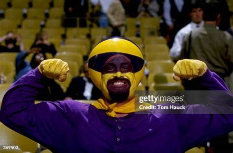 The Mascot of the Los Angeles Lakers poses as he wears his purple ...