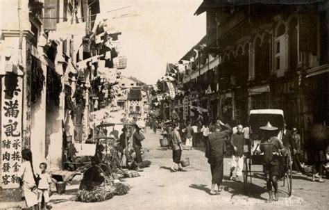 A street in Chinatown, Singapore with a rickshaw in the foreground | History of singapore ...