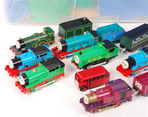 A LARGE collection of assorted c1995 Tomy made ' Thomas The Tank Engine ' battery operated train