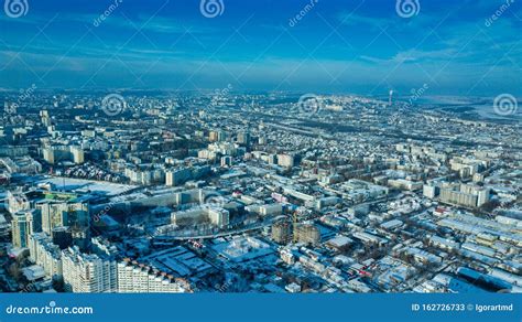 Top View of City in Winter at Sunset on Sky Background. Aerial Drone ...