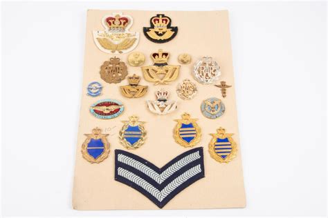 Post 1953 RAF insignia: Medical Branch officer's cap badge, officer's beret badge, WO's cap and bere