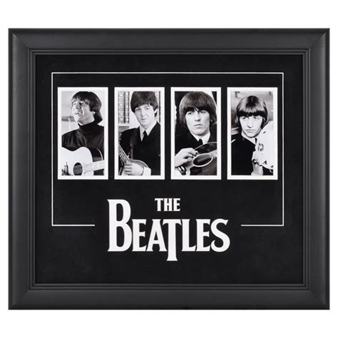 the beatles framed photo in black frame with white lettering and four pictures on each side