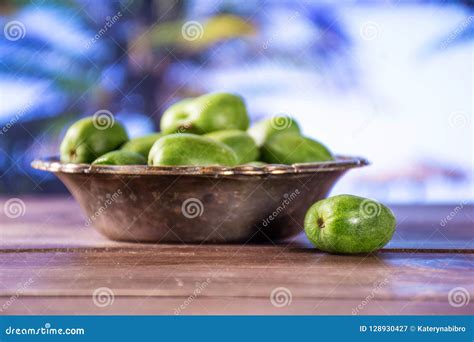 Fresh Green Mini Baby Kiwi Fruit with Palm Each Behind Stock Image - Image of dessert, bowl ...