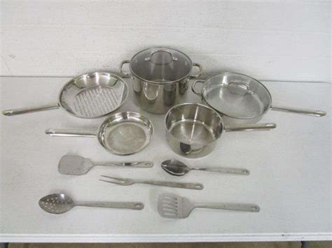 11 Pc. Wolfgang Puck Stainless Cookware & Utensils Set - Oberman Auctions