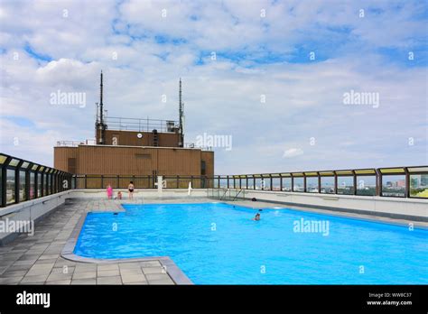 Swimming pool at roof of wohnpark alt erlaa residential complex hi-res stock photography and ...