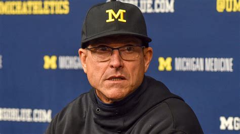 Michigan’s Jim Harbaugh will be credited for wins despite being banned ...