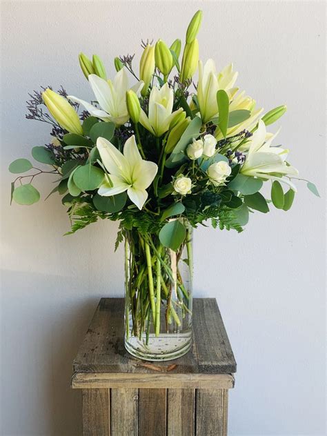 White lily arrangement | White lilies, Arrangement, Local florist