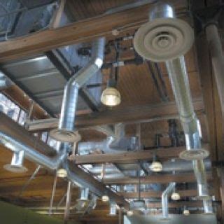 Exposed duct work in the ceiling can give a contemporary look ...