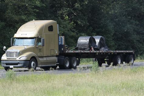 PICS OF LOADED FLATBED SEMI TRAILERS OF VARIOUS SEMI TRUCKING COMPANIES ...