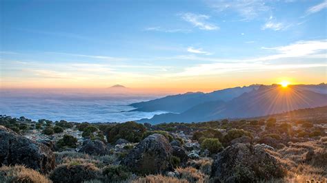 Sunrise at Mount Kilimanjaro Shira camp with Mount Meru in a distance ...