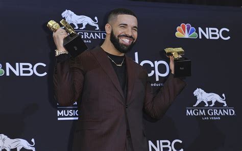 Drake sweeps Billboard awards, breaking Taylor Swift's record for most ...