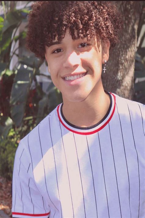 Image may contain 1 person baseball and outdoor | Boys with curly hair, Light skin boys, Cute ...