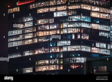 Office building with glass facade - night photograph Stock Photo - Alamy