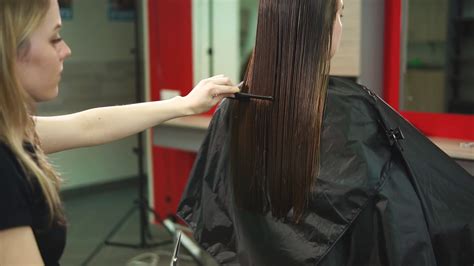 The Hairdresser Of Beauty Salon Is Cutting Stock Footage SBV-315786780 - Storyblocks