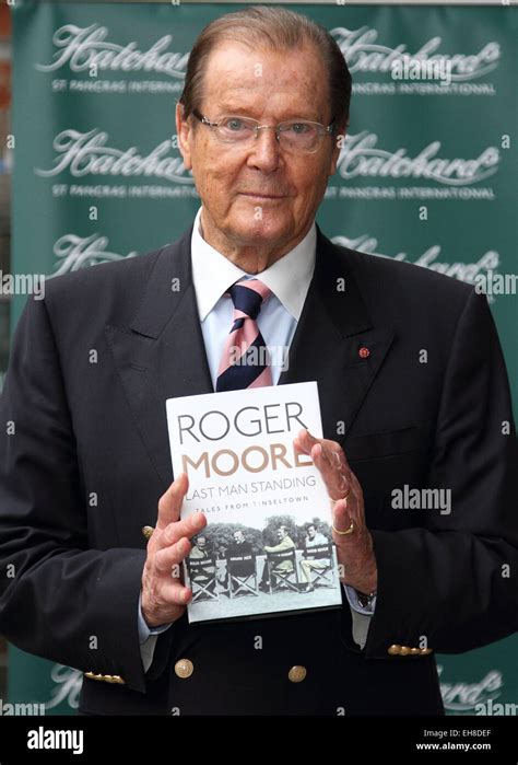 Sir Roger Moore signs copies of his autobiography 'Last Man Standing: Tales From Tinseltown', at ...