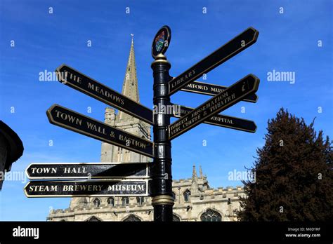 Tourist Information Sign, All Saints church, Red Lion Square, Georgian market town of Stamford ...