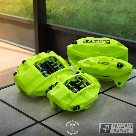 Akebono Brake Calipers done in Neon Yellow | Prismatic Powders