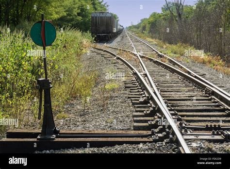 Old fashioned manual train track switch and rails Stock Photo - Alamy