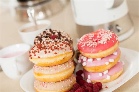 Donuts on white on table. stock image. Image of snack - 60412477