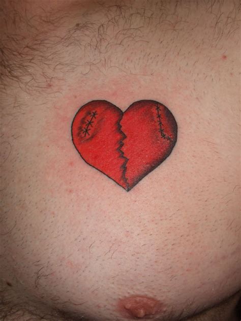 Red Broken Heart Tattoo On Chest | Tattoo Designs, Tattoo Pictures