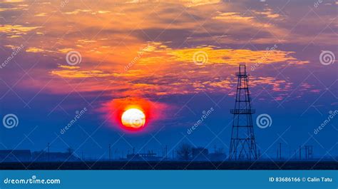 Abandoned Oil and Gas Rig Profiled on Dramatic Evening Sky Stock Photo ...