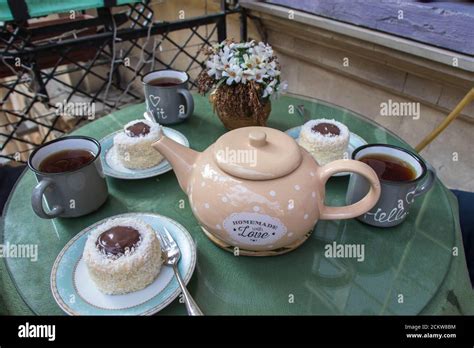 Teapot and teacup in vintage style Stock Photo - Alamy