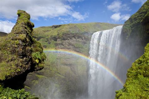 Rainbow Over Waterfall Skogafoss, Iceland Stock Image - Image of ...