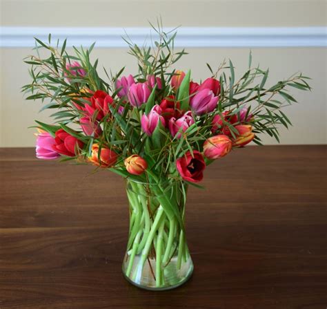 Tulip arrangement. | Tulips arrangement, Tulip centerpiece, Fresh ...