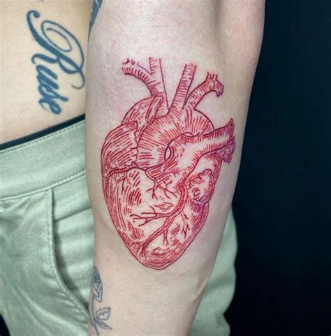 Black Human Heart Tattoo