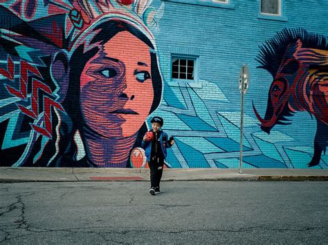 HD wallpaper: boy standing near vandalism art during daytime, boy standing near wall artwork ...