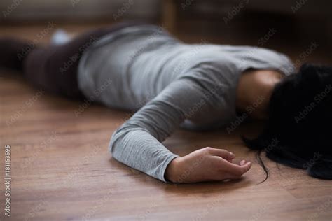 dead woman body lying on floor at crime scene Stock Photo | Adobe Stock