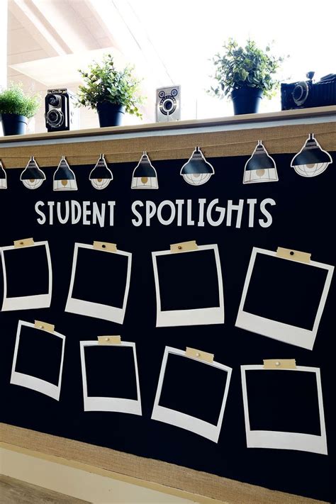 a bulletin board with pictures hanging from it's sides and the words student spotlights written ...