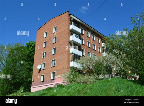 Old five-story brick house Stock Photo - Alamy