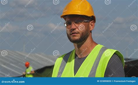 Solar Power Station Employee Looking at Camera Stock Photo - Image of employee, helmet: 223890820