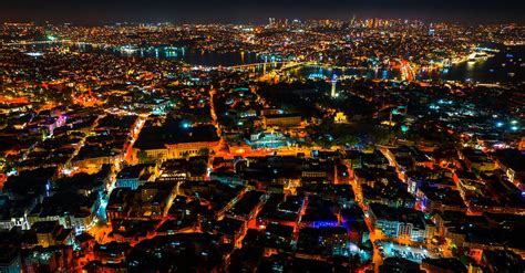 Aerial View of City Buildings During Night Time · Free Stock Photo