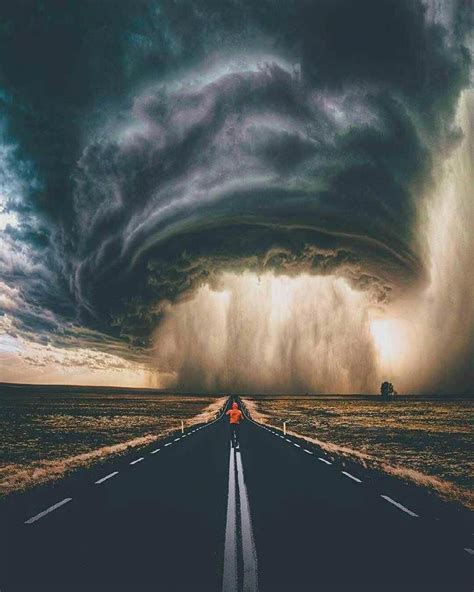 A supercell thunderstorm rolls across the Montana prairie at sunset. | Nature photos, Storm ...