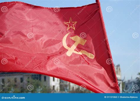 Red Flag with a Hammer and Sickle Editorial Stock Photo - Image of proud, sunny: 31131063