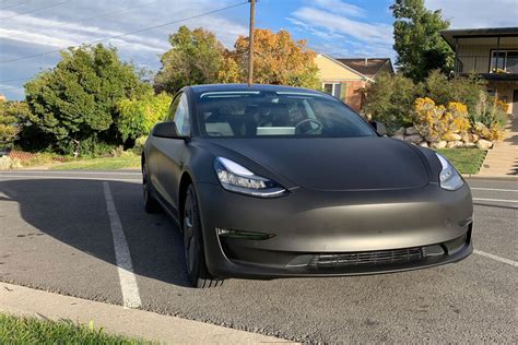 Matte black Tesla Model 3, stunning photos, wrap cost and info