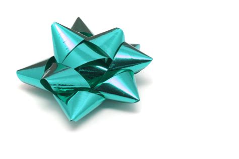 Photo of Ornate cyan bow for gift wrapping | Free christmas images